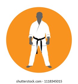 Standing man in kimono - martial arts fighter, judoist