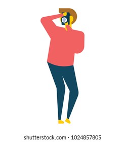 Standing man taking photo with camera, flat vector icon 
