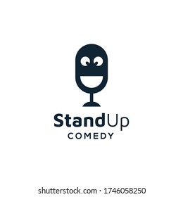 standing microphone with funny face symbol for stand up comedy logo