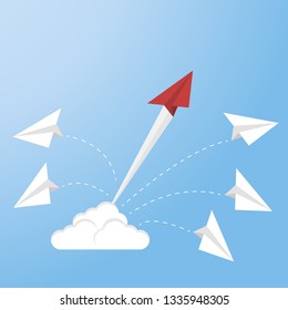 Standing out from the crowd.Red airplane changing direction and white ones. New idea, change, trend, courage, creative solution, innovation and unique way concept.