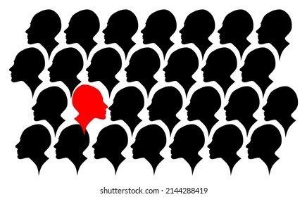 Standing out from the crowd. The profile silhouette looks in the opposite direction than all the others. Concept of thinking different.
