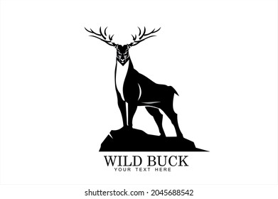 standing stag. big buck standing on the hill