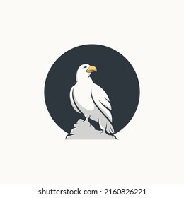 standing white eagle animal logo