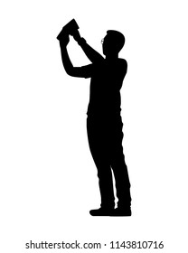 Standing young man with wallet silhouette vector
