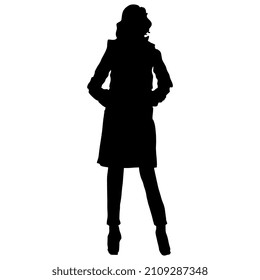 Standing young slender girl wearing skinny pants   coat  Black   white female silhouette  Hands in pockets akimbo pose  