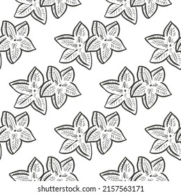 Star carambola slices seamless pattern vector illustration. Background exotic tropical asian fruit sliced hand engraving. Sketch healthy organic food template