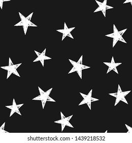 Star doodles seamless pattern. Hand drawn stars texture background.