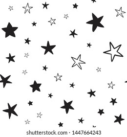 Star doodles seamless pattern. Hand drawn stars texture background.