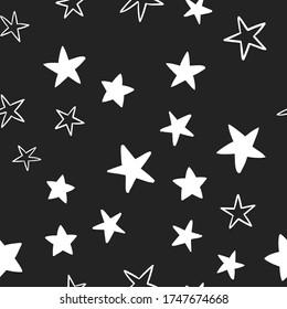 Star doodles seamless pattern. Hand drawn stars background texture.