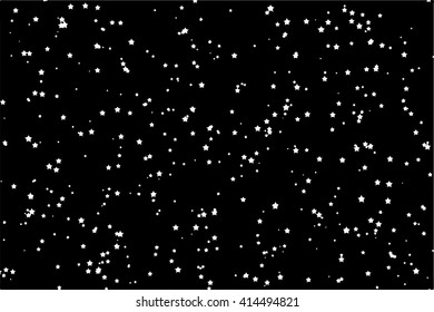 Star dust particles on black background
