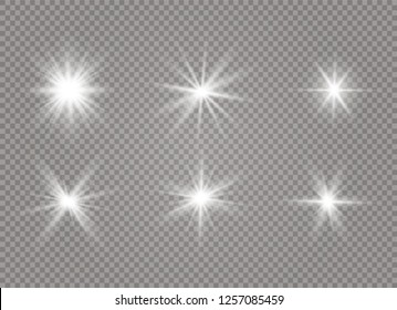 Star explodes on transparent background. Sparkling magic dust particles. Bright Star. The transparent shining sun, bright flash. Vector sparkles. To center a bright flash.