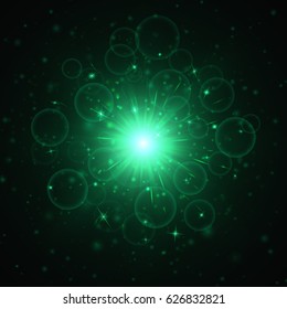 Star explosion with a green light effect for a festive decoration on a dark background