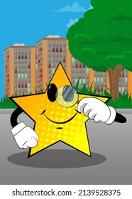 Star holding a magnifying glass. Funny and cute cartoon character, with anthropomorphic face.