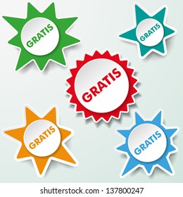 Star paper labels with the text gratis.