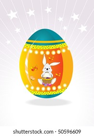 star and rays background with decorated easter egg