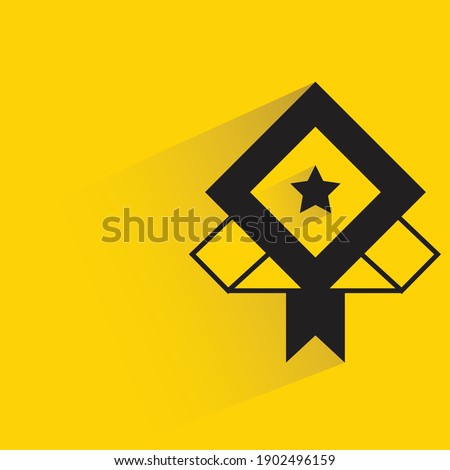 star and ribbon reward with shadow on yellow background