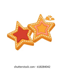 Galletas con forma de estrella con caramelo, enmarcadas con puntos de azúcar