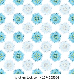 A star shaped mandalas seamless vector pattern in blue, white and yellow colors. Decorative cal surface print design.