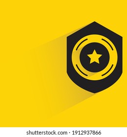 star shield badge drop shadow on yellow background