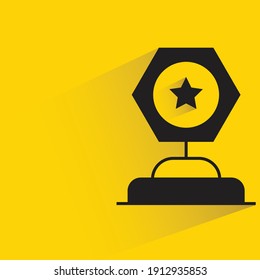 star trophy drop shadow on yellow background