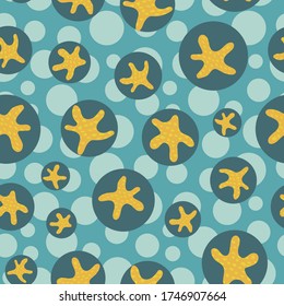 Starfish on dots vector seamless pattern in teal and yellow colors for fabric, wallpaper, packaging, scrapbooking projects or backgrounds. Surface pattern design.