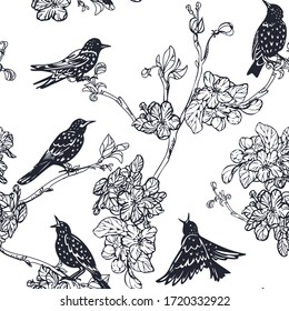starlings and blooming branches seamless pattern silhouettes of birds and flowers