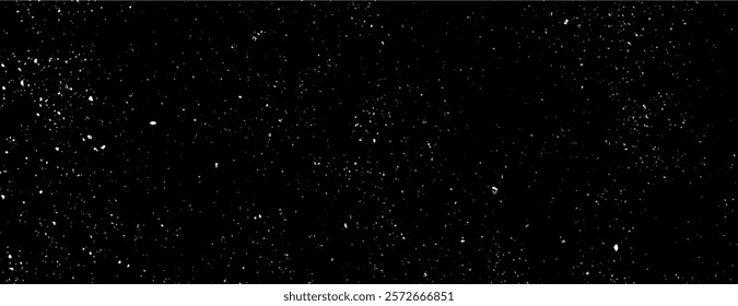 Starry black background with a cosmic style. The black background features a speckled texture, resembling a night sky with scattered stars. Speckled wall texture background. Black background vector.