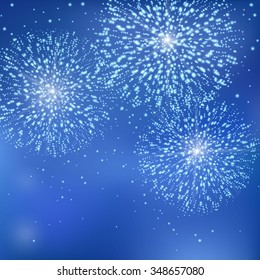 Starry fireworks on blue background