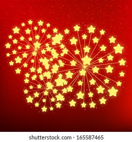 Starry fireworks on red background