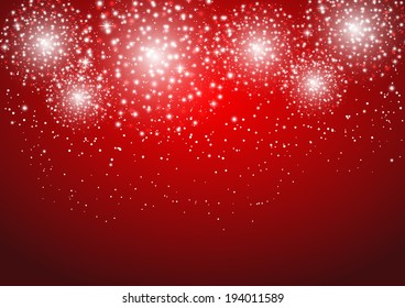 Starry fireworks on red background
