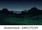 Starry night over meadow with tree silhouette and mountain