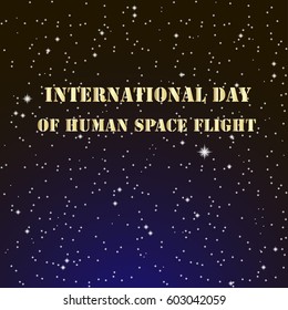 Starry night sky. phrase International Day of Human Space Flight