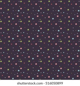 Starry night sky seamless pattern. Red, green, blue stars and spots on dark violet background vector illustration. Outer space. For gifts wrapping paper, greeting cards, holiday invitations design