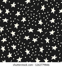 Starry night vector pattern. Backdrop with yellow gradient stars. Dark seamless background.