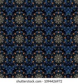 Starry Sky. Falling snow. Seamless texture with blue, green and beige snowflakes and dots on a black background.