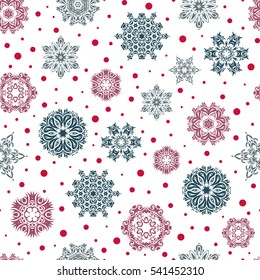 Starry Sky. Falling snow. Seamless texture with red and pink snowflakes and dots on a white background.