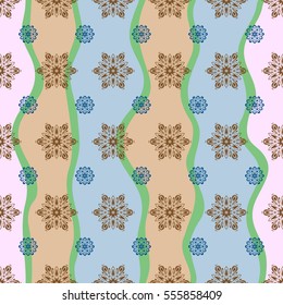 Starry Sky. Falling snow. Seamless texture with brown and blue snowflakes and dots on a wave background.