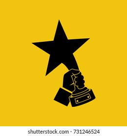 Stars awards hold in hand winner black icon. Golden trophy. Vector illustration flat style design. Isolated on white background. First place. Victory prize. Winning achievement. Symbol of success.