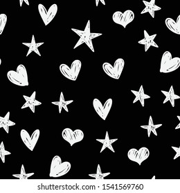 Stars and hearts doodles seamless pattern. Hand drawn texture background.