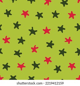Stars pattern. Seamless vector illustration. Green and red elements on a light green background. Great for backdrop decoration, cards, wallpaper, textiles, fabric, wrappers, additions to the design.