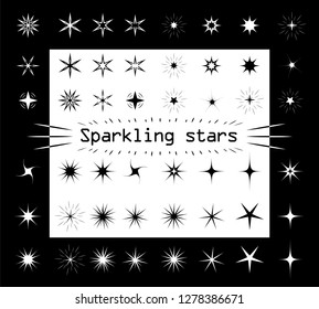The stars sparkle on a white and black isolated background. Different shapes and kinds for your design. Asterisks silhouette, flat style. Vector illustration.