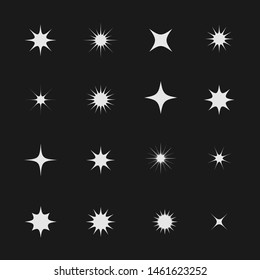 Stars and sparks. Magic star and sparks icon set over black background, Vector illustration