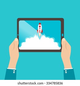 Start up business concept for mobile app development or other disruptive digital business ideas. Cartoon rocket launching from tablet.