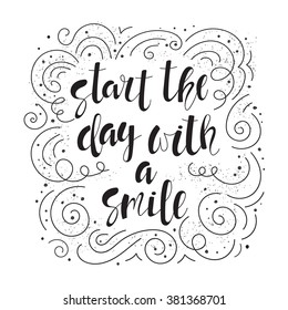 Start the day with a smile - motivational quote, typography art. Hand-written lettering on a white background with twirl ornament. Lettering for posters, cards design.