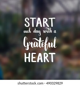 Start each day with a grateful heart. Illustration with hand-lettering inspiration and motivation quote. Drawing for prints with phrase.