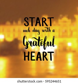 Start each day with a grateful heart. Illustration with hand-lettering inspiration and motivation quote. Drawing for prints with phrase.