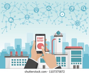 Start factory concept. Phone in hand with start button. Industrial background.