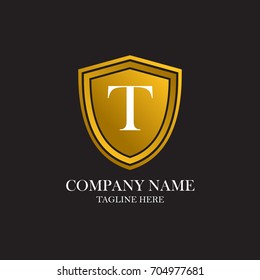 A start letter T with a gold shielded logo with background black