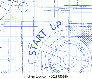 Start up text with gear wheels hand drawn on graph paper technical drawing background
