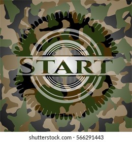 Start written on a camouflage texture